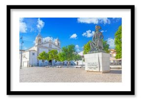 Statue of Infante Dom Henrique and church in Lagos Algarve Portugal