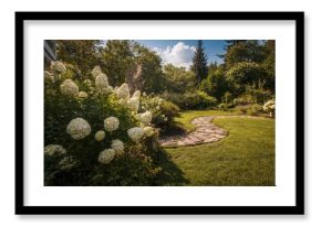 Private summer garden featuring vibrant Annabelle hydrangeas, rich lawn borders, and an elegant walkway. Landscape architecture.