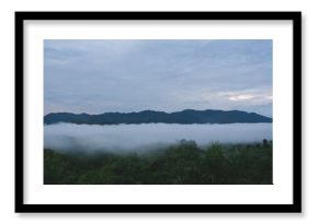 Landscape image of mountains peak and sky with the sea of clouds