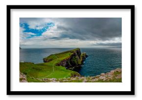 Scotland, United Kingdom: aerial view of the sheer cliff of Neist Point lighthouse (1909), famous promontory and viewpoint on the most westerly point on the Duirinish peninsula on the Isle of Skye 