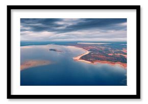 Gloomy autumn view from flying drone of Svityaz lake. Splendid morning scene of Shatsky National Park, Volyn region, Ukraine, Europe. Traveling concept background.