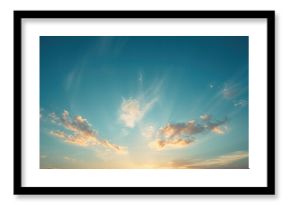 Sunset-lit blue sky with subtle cloud formations, ideal for nature scene backdrops