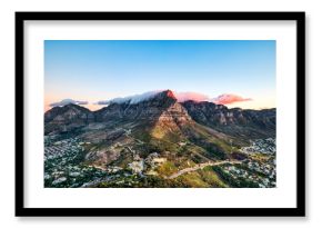 Cape Town Sunset over Camps Bay Beach with Table Mountain and Twelve Apostles in the Background