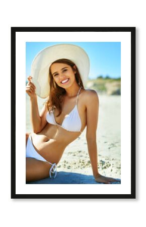 Young woman, portrait and beach with bikini, vacation and hat on spring break with travel. Holiday, body health and Mediterranean sea with sitting, outdoor and ocean with female person from Italy