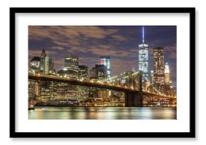 Brooklyn Bridge and Downtown Skyscrapers in New York at Dusk