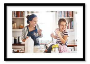 Mother, play or kid baking in kitchen as a happy family with an excited girl laughing or learning cookies recipe. Playful, flour or funny mom helping or teaching kid to bake for development at home