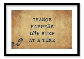 Inspiring motivation quote of change happens one step at a time with typewriter text. Distressed Old Paper with Typing image.