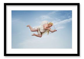 Funny overweight cupid aiming with the arrow of love over clear blue sky with copy space