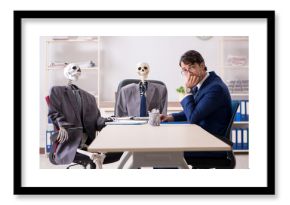 Funny business meeting with boss and skeletons