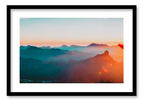mother and son travel in mountains at sunset, panorama