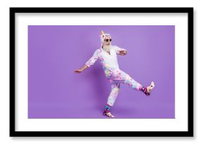 Full length body size view of nice funny cheerful man in pajama walking having fun isolated over violet purple color background