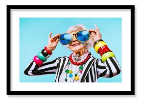 Cool and stylish senior old woman with fashionable clothes