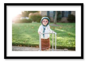 toddler girl dresses up as old lady with walker for Halloween