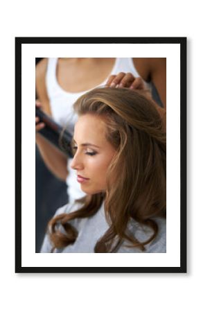 Taking a day to treat herself - Beauty treatment. A beautiful young woman spending the day getting her hair and makeup done.
