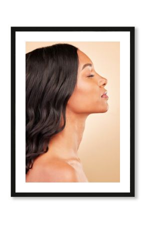 Hair, profile and curls with woman, beauty with keratin treatment and cosmetic care isolated on studio background. Shine, salon hairstyle and haircare with texture, growth and wellness with waves
