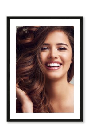 Beauty, hair and portrait of confident woman in studio on gray background for keratin or shampoo treatment. Aesthetic, cosmetics and wellness with natural model at salon for conditioning or haircare