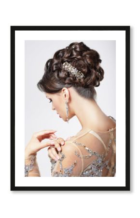 Elegance. Chic. Beautiful Brunette with Classy Hairstyle. Luxury