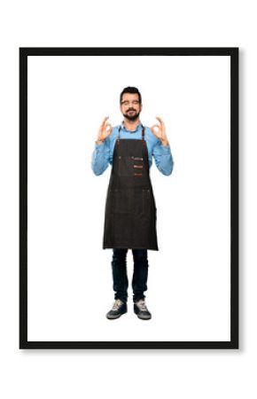 Full-length shot of Man with apron in zen pose over isolated white background