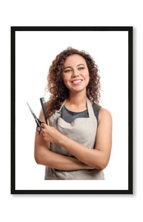 Beautiful African-American hairdresser on white background