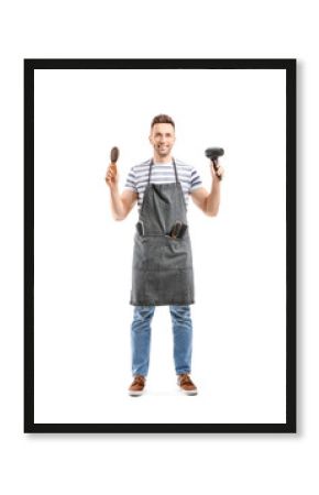 Portrait of male hairdresser on white background