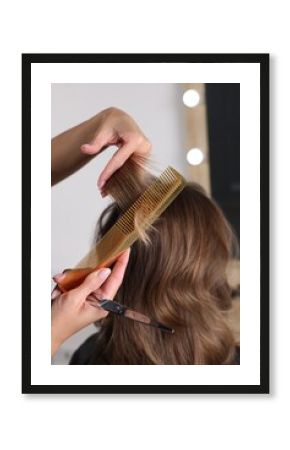 Hair cutting. Professional hairdresser working with client in salon, closeup