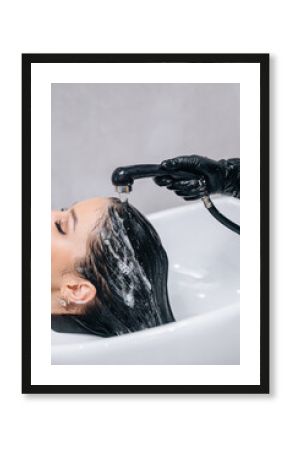 Water, shampoo and hair care for client with hairdresser, salon and scalp treatment with massage. Basin, tap and washing with hands for dye hairstyle, relax and customer person for keratin service