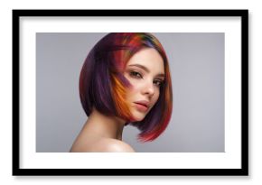 Beautiful woman with multi-colored hair and creative make up and hairstyle. Beauty face.