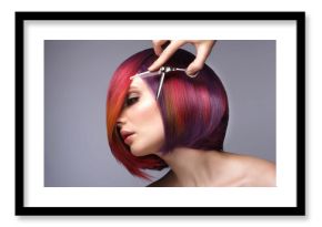 Beautiful woman with multi-colored hair and creative make up and hairstyle. Beauty face.