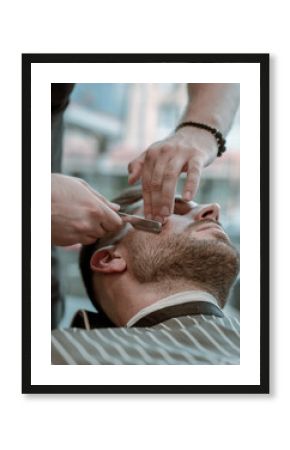 barbershop photography. portrait of a man during hairut