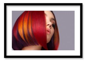 Beautiful woman with multi-colored hair and creative make up and hairstyle. Beauty face.