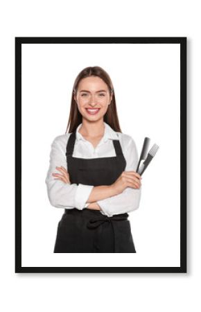Portrait of happy hairdresser with combs on white background