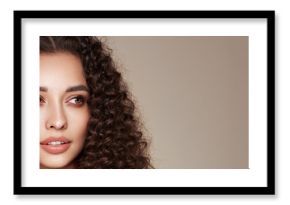 Fashion studio portrait of beautiful smiling woman with afro curls hairstyle. Fashion and beauty