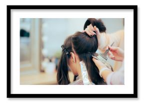 Hairdresser Sectioning and Dying the Hair of a Client. Woman changing her hair style and color in a professional salon 