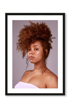 Afro, hairstyle and portrait of black woman with confidence, pride and elegant salon hair care. Natural haircare, curls and style on female model with growth, keratin and treatment on pink background