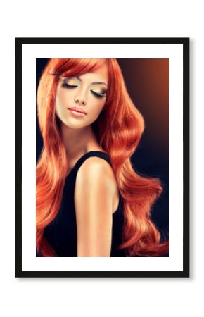 Beautiful model girl  with long red curly hair . Hairstyle and  cosmetics