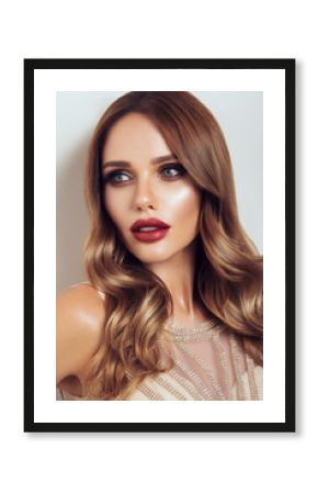 Beautiful model with curly hairstyle. Beautiful make up