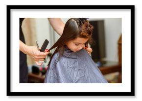 Little Girl Having Her Hair Cut. Little Girl Sitting In Beauty Hair Salon Style For Children.