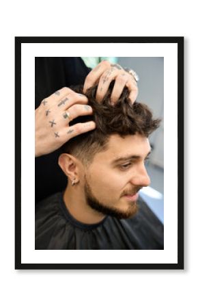 Barber use cream to enhance client new hairstyle