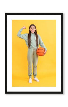 successful teen basketball girl in studio. teen basketball girl on background.