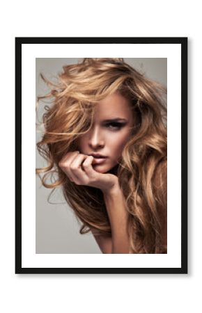 Vogue style portrait of delicate blonde woman