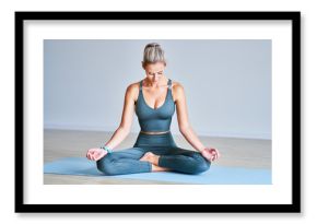 Adult woman practising yoga at home