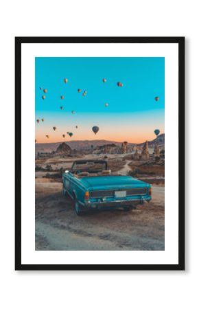 retro car on cappadocia and hot air baloons