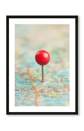 A red location pin highlights a designated area on a detailed map indicating various geographical features and routes