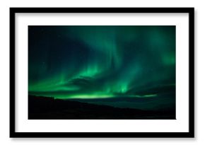 Northern lights above lagoon in Iceland