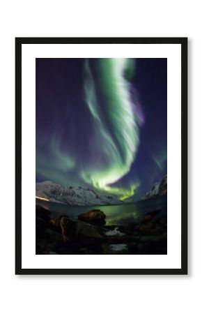Aurora Borealis reflected between fjords in Tromso
