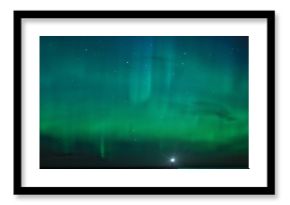 Landscape with Aurora Borealis over the Ladoga Lake and a lighthouse