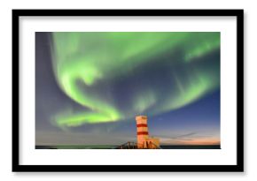 Gardur Lighthouse under aurora borealis, Iceland