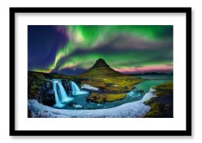 Northern Light, Aurora borealis at Kirkjufell in Iceland. Kirkjufell mountains in winter.