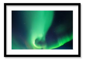 Night starry sky and Northern lights. Green aurora borealis