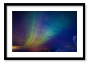 Aurora Borealis Known as Norther Lights Playing with Vivid Colors Over Lofoten Islands in Norway.